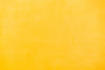Yellow microcement texture background