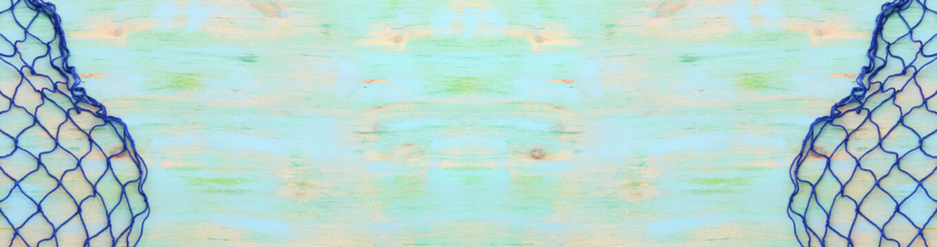 Top view of Fishnet on pastel blue wooden background. top view, flat lay