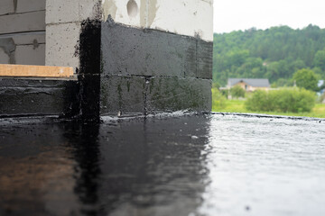 the terrace is covered with a layer of waterproofing mastic