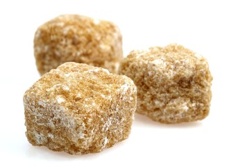 Cubes of Brown Sugar against White Background