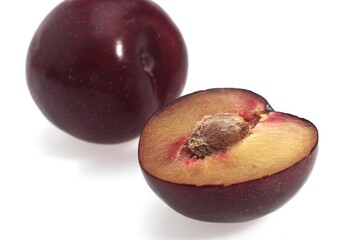 Red Plums, prunus domestica, Fruits against White Background