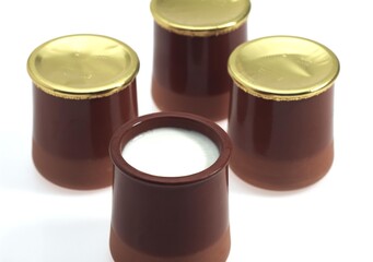 Glasses of Natural Yoghurt against White Background