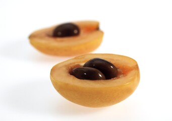 Medlars, eriobotrya japonica, Fruits against White Background