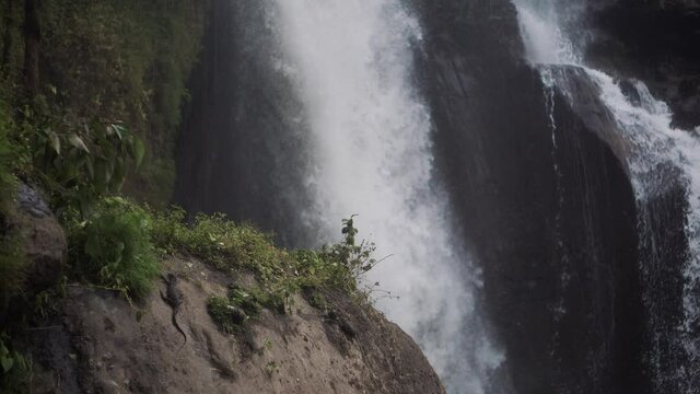 Scene with powerful waterfall