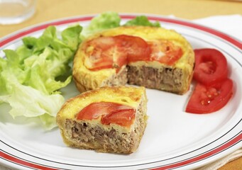 Tuna Quiche with Tomato and Salad in a Plate