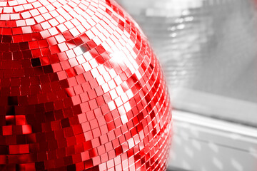 Red Disco ball. Mirror ball. Concept of a night club party, club life.