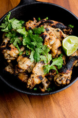 Grilled chicken. BBQ Chicken grilled in garlic and butter. Chicken, fried & served w/ bbq side dishes, organic vegetables and dressed in olive oil. Classic American outdoor grill entree favorite.