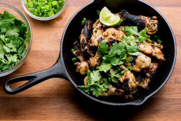 Grilled chicken. BBQ Chicken grilled in garlic and butter. Chicken, fried & served w/ bbq side dishes, organic vegetables and dressed in olive oil. Classic American outdoor grill entree favorite.