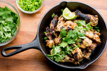 Grilled chicken. BBQ Chicken grilled in garlic and butter. Chicken, fried & served w/ bbq side dishes, organic vegetables and dressed in olive oil. Classic American outdoor grill entree favorite.