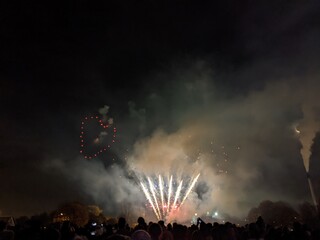 fireworks night celebration and heart shaped firework