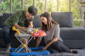 Diversity Lesbian sitting with cute toddler girl in between. Happiness and family bonding in LGBTQ family, LGBT lifestyle.