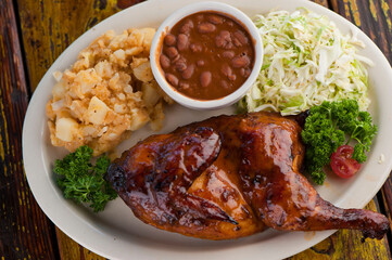Brisket, pork sausage, pork ribs, beef ribs. Barbecue platter served with classic bbq sides Mac n cheese, cornbread, Brussels sprouts, coleslaw & beer. Classic traditional Texas meats & side dishes.
