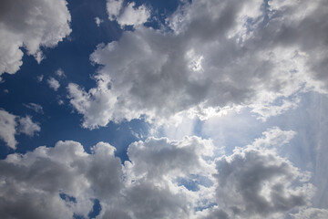 Beautiful cirrus clouds against the blue sky.  Blue sky background with clouds
