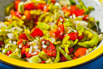 Lettuce texture close up. Fresh salad of vegetables, tomatoes and cucumbers.