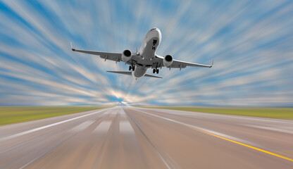 White Passenger plane fly up over take-off runway from airport 