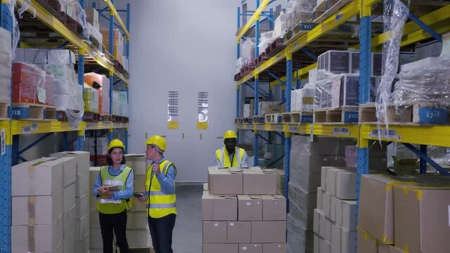The worker is working in the warehouse, factory industry background