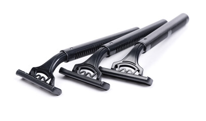Group of new black plastic disposable shavers