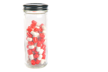 Frasco de vidrio con píldoras