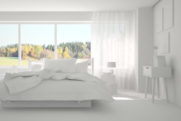 White stylish minimalist bedroom with armchair and autumn landscape in window. Scandinavian interior design. 3D illustration