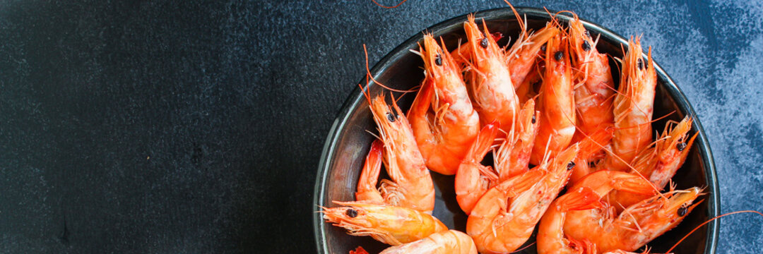 shrimps cooked seafood ready to eat prawn natural product
ingredient serving size snack. food background top view copy space healthy eating raw pescetarian 