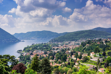 Fototapeta na wymiar View of Lake Como, coastal towns and the surrounding mountains