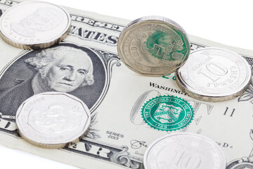 Ukrainian hryvnia next to the dollar on a white background, isolate. The concept of the...