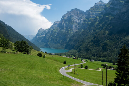 View on the lake Kloental, a well known place in Switzerland, from above with a street in front, Glarus, Switzerland