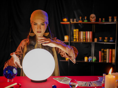 Asian Woman Fortune Teller Using Divine Magical Power Crystal Ball To Forecast Psychic Future Luck