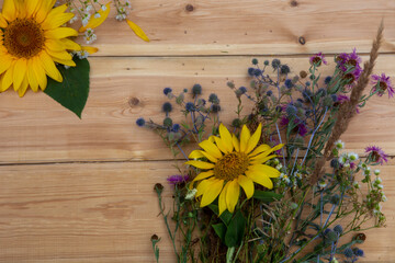 sunflowers on wooden table