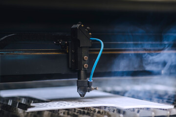 Automated self working laser cutting machine during progress.