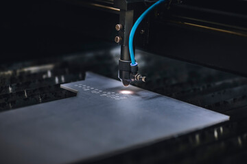Automated self working laser cutting machine during progress.