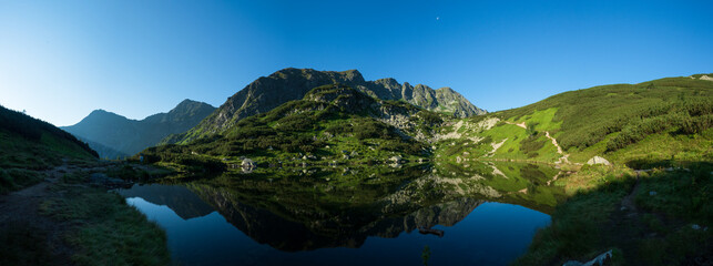 mountain landscape with lake and mountains