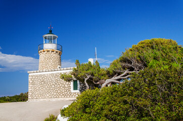 Fototapeta na wymiar Skinari lighthouse on the north of Zakynthos island on Ionian Sea, Greece.