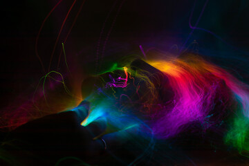 Obraz premium light painting portrait, new art direction, long exposure photo without photoshop, light drawing at long exposure