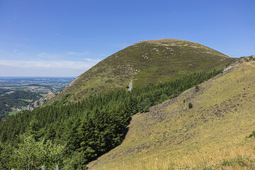 Fototapeta premium Beautiful highland landscapes in Volcans d'Auvergne regional Natural Park. Monts Dore - the heart of the Massif Central, Auvergne-Rhone-Alpes administrative region, France.