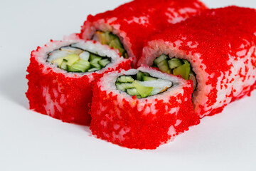 Japanese traditional food. Sushi rolls philadelphia with fresh avocado caviar and cream cheese