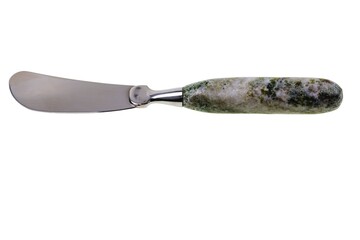 Fototapeta premium Close up view of handmade butter knife on white background. Kitchen supplies concept.
