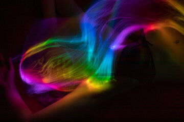 light painting  erotic portrait, light drawing at long exposure, abstract colorful background 
