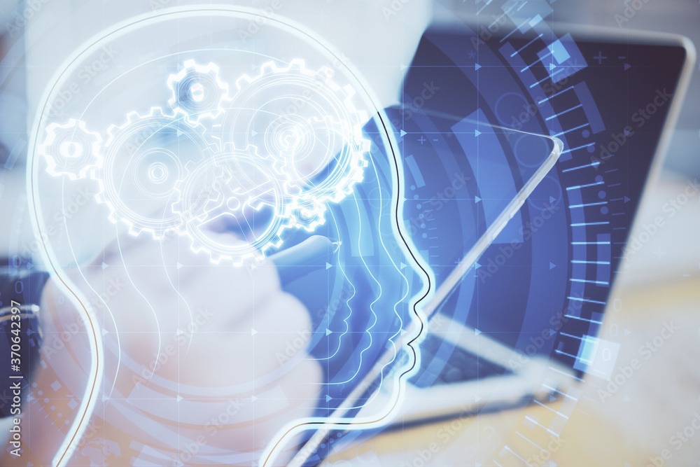 Poster Hands using laptop and tablet with glowing head with cogs.