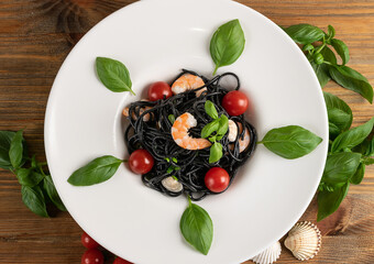 Black Spaghetti with Shrimps on White Restaurant Plate