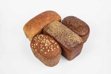 Bakery product. Bread. Beautiful composition with different bread on a white background. Isolate. Space for text. Top view and copy space for text.