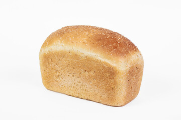 Bakery product. Fresh white molded bread with sesame seeds isolated on white background. Top view and copy space for text.