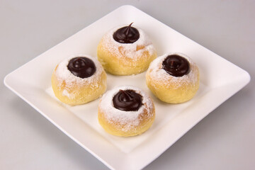 Sweet bread stuffed with dulce de leche (doce de leite). Traditional Brazilian sweet.
