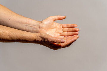 empty woman's hands in the helping position
