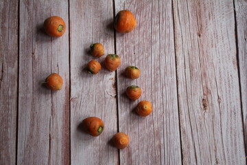 Obraz premium hazelnuts on wooden table