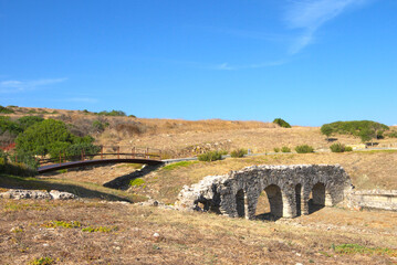 Fototapeta na wymiar Scenic landscape with ruins of Baelo Claudia is an ancient Roman town on the coast of Spain, Bolonia, Andalusia, Spain.