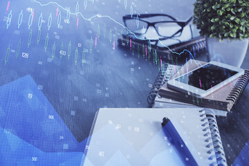 Double exposure of forex chart drawing and cell phone background. Concept of financial trading