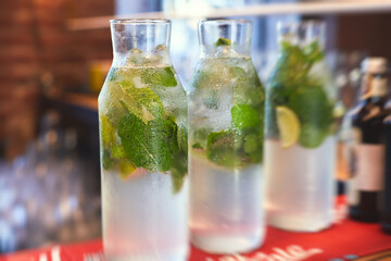 View of lemonade bar on a catering banquet table on party event, beverage selection variety on a party event