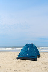 Camping with tent at the beach