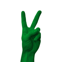 Hand making victory sign, libya painted with flag as symbol of victory, win, success - isolated on white background